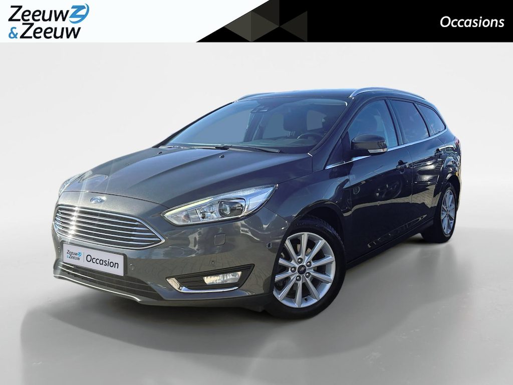 Ford Focus Wagon 1.0 Titanium |Lederen/stof bekleding| Trekhaak| bi-xenon koplampen| keyless entry| 12 maanden Bovag garantie|
