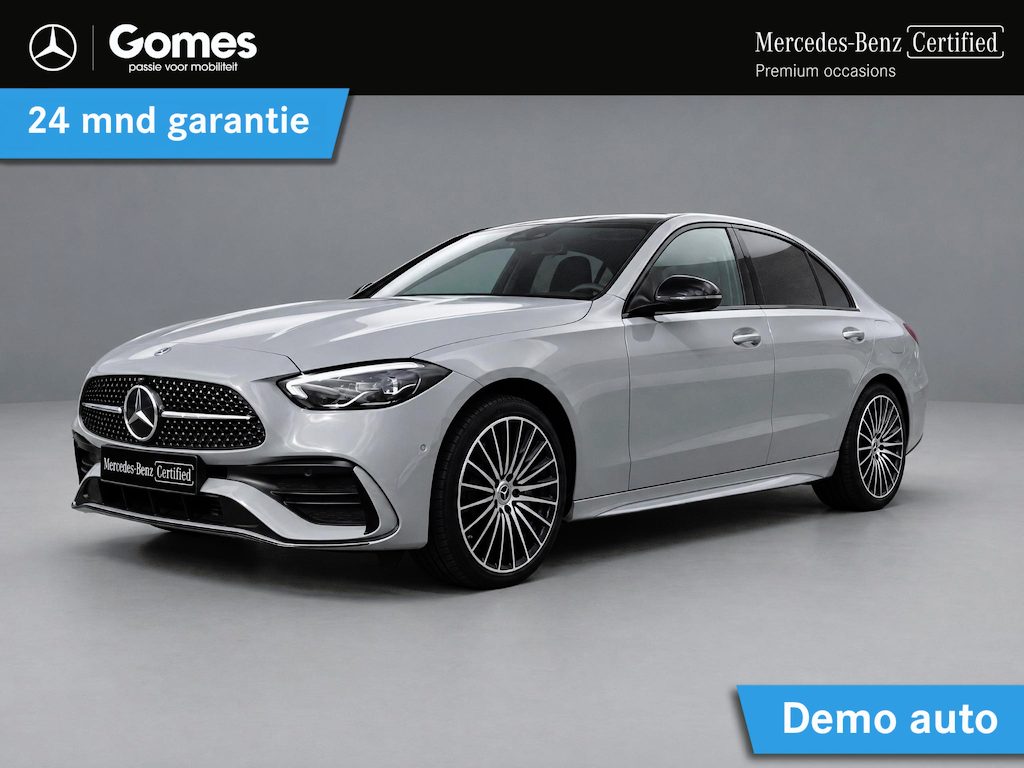 Mercedes-Benz C-klasse 300 e AMG Line | Trekhaak | Night Pakket | Winter Pakket | Panoramadak | 360° Camera | DISTRONIC Afstandsassistent | Dodehoekassistent | Verkeersbordenassistent | Apple CarPlay | Android Auto | Elektrisch Verstelbare Stoelen + Memory | Stoelverwarming | Sfeerverlichting | Sierdelen Hout Aluminium Lines Zwart | Elektrisch Inklapbare Buitenspiegels | Parkeersensoren