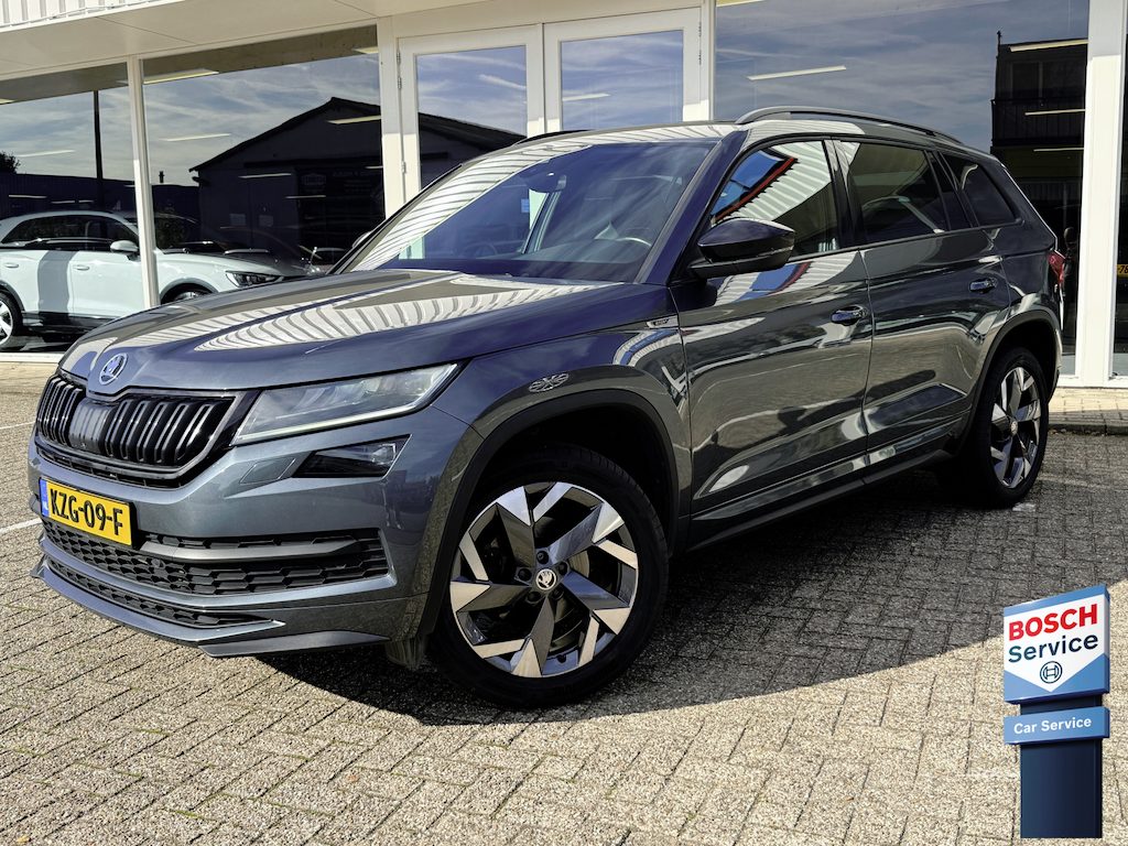 Skoda Kodiaq 1.5 TSI Sportline Business | Trekhaak | Adapt. Cruise | Apple/Android | Stoelen- Stuur en achterbank verwarmd | Pano