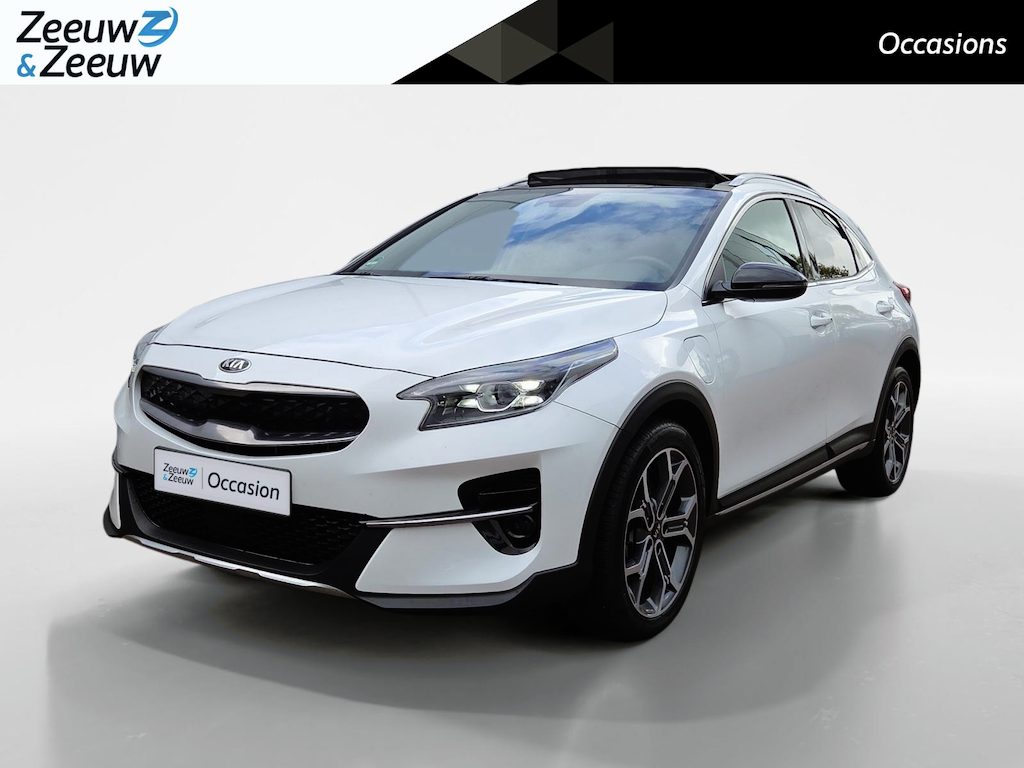Kia Xceed 1.6i PHEV ExecutiveLine 1e Eigenaar | Dealer Onderhouden | Meest luxe uitvoering | Fabrieksgarantie | Stoelverwarming en Ventilatie | Carplay & Android | Camera | Dodehoek Detectie | Leder | Cruise Control Adaptief | Panorama Dak |