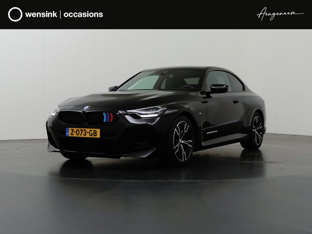 BMW 2-Serie Coupé 218i | M-Pakket | HUD | Stuur/stoelverwarming | Curved Display | Sportstoelen | Camera | DAB | Adaptieve Cruise Control |