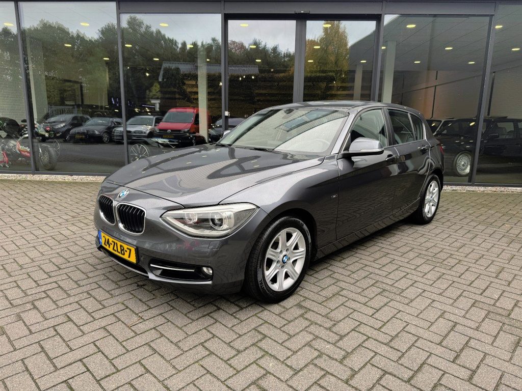 BMW 1-Serie 118i 170pk Sportline,Leer,Xenon,Navi,Clima,Cruise,Dealer OH