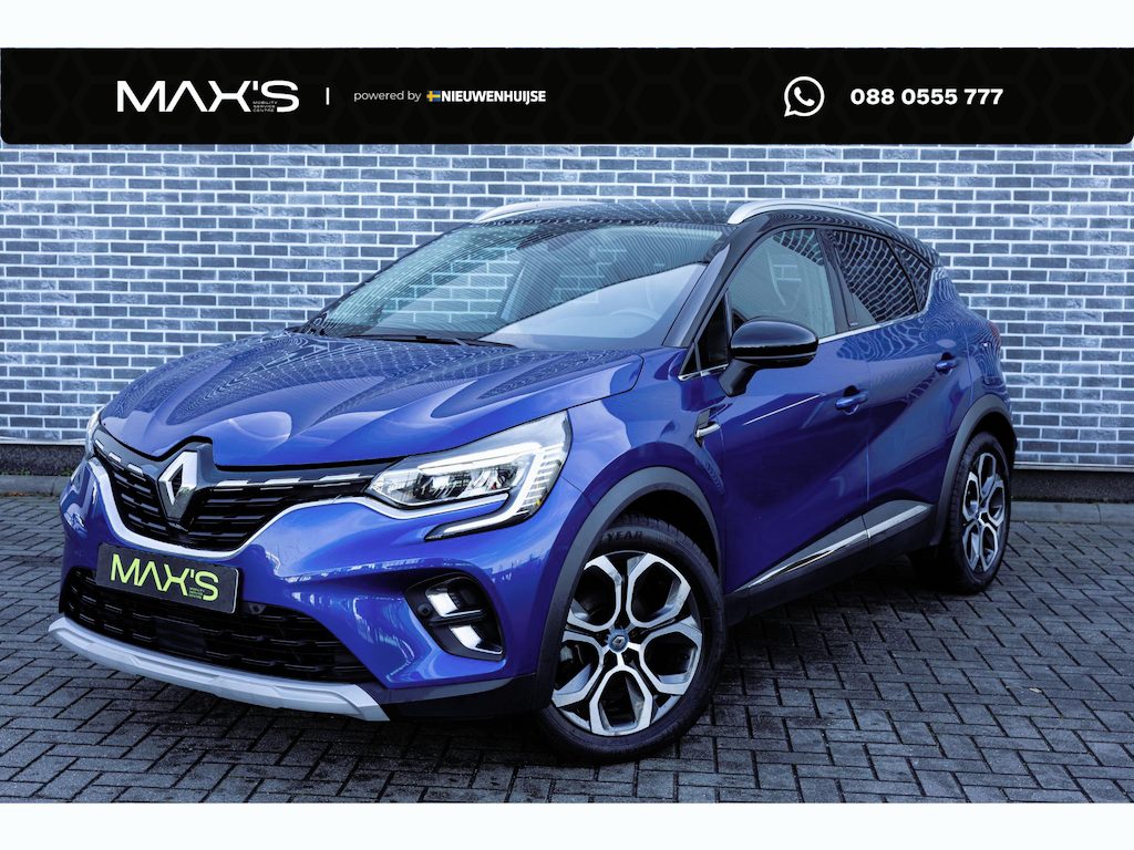 Renault Captur 1.6 E-Tech Plug-in Hybrid 160 Edition One | Achteruitrijcamera | Parkeersensoren | Keyless Entry | Lichtmetalen Velgen 18 inch | Dakrails | Privacy Glas | Stoelverwarming | Cruise Control Adaptief | Navigatie 7 inch | Apple Carplay | Android Auto