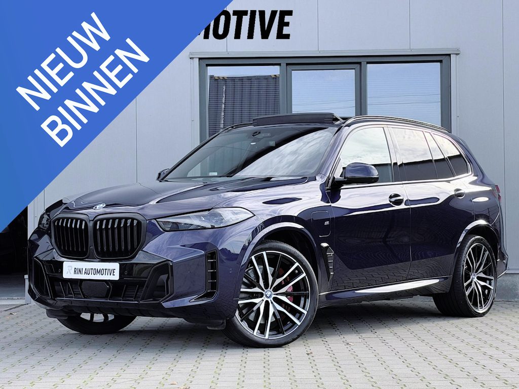 BMW X5 xDrive50e M sport Pro | 490 PK | Trekhaak | Pano | M Stoelen | Individual Tansanitblau metallic | Long Range