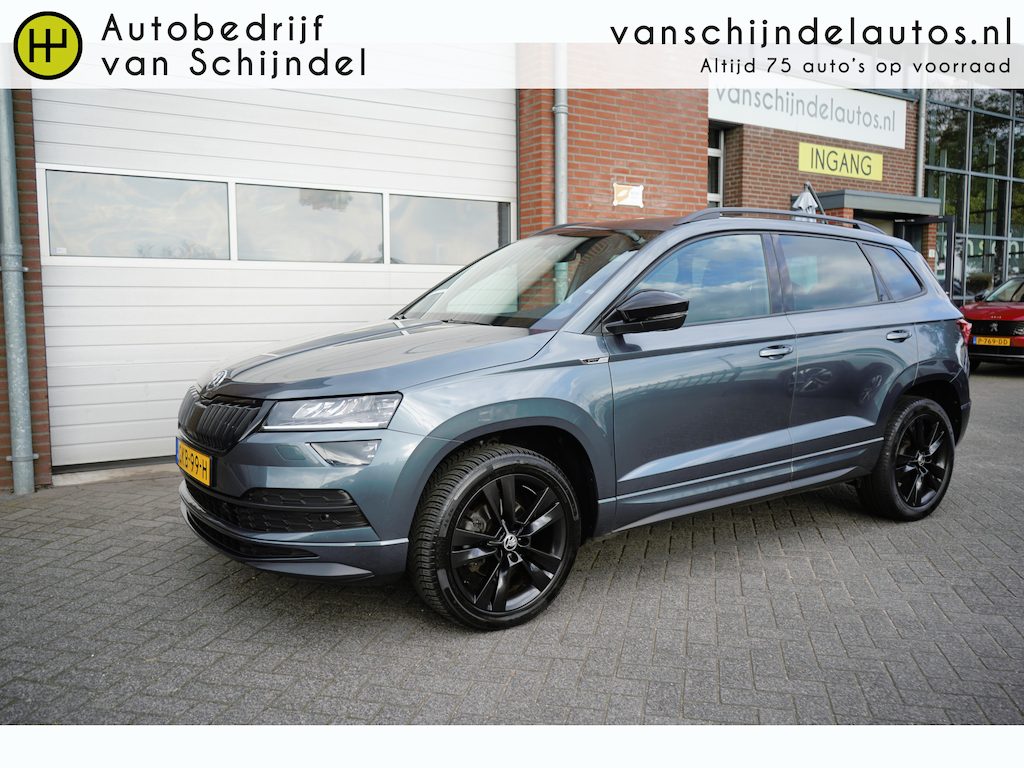 Skoda Karoq 1.5 TSI ACT 150PK SPORTLINE BUSINESS VOL LUXE PANORAMADAK ZWARTE HEMEL CAMERA STOEL+STUURVERWARMING ADAPTIEVE CRUISE ANDROID/APPLECARPLAY NAVI CLIMA PDC V+A BLUETOOTH 18INCH ENZ...