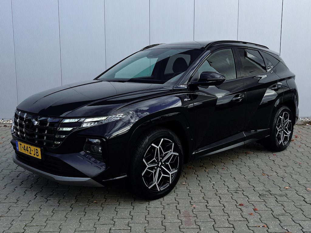 Hyundai Tucson 1.6 T-GDI HEV N-Line Business Sky | Trekhaak | All-season banden | Elektrisch glazen panorama-dak | Cruise Control Adaptief | Apple Carplay/Android Auto | Stoel en stuurverwarming |