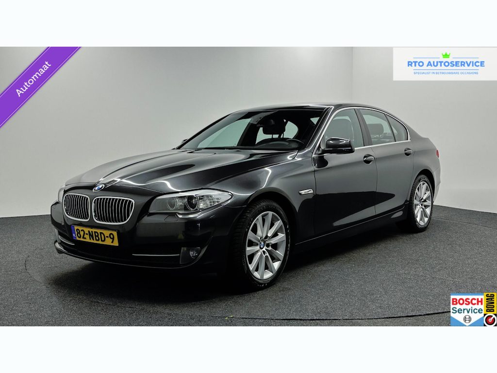 BMW 5-Serie 523i High Executive LEER NAVI ECC STOELVERWARMING.
