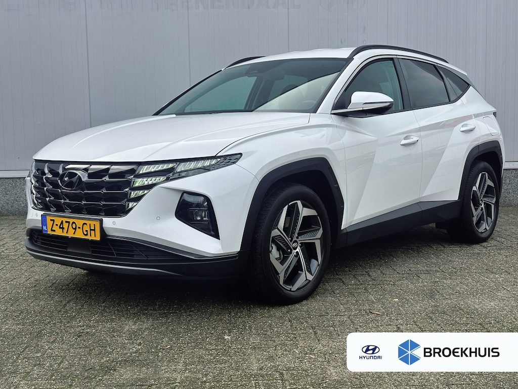 Hyundai Tucson 1.6 T-GDI 265pk PHEV Comfort Smart 4WD | Climate | Camera | Carplay | Keyless | Navigatie | Full - Led | Elek. Klep | Winterpakket | 19" Lichtmetaal | Krell Audio | Digitale Cockpit | Parkeer Assistent | Adapt. Cruisecontrol