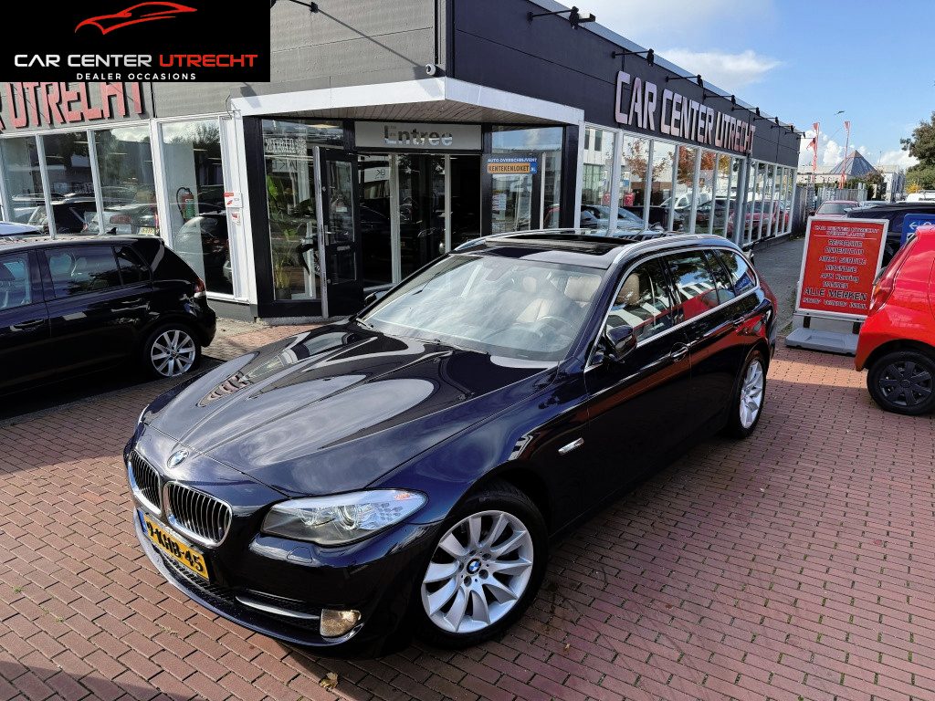 BMW 5-Serie Touring 520i High Executivevol automaat leer navi pano trekhaak