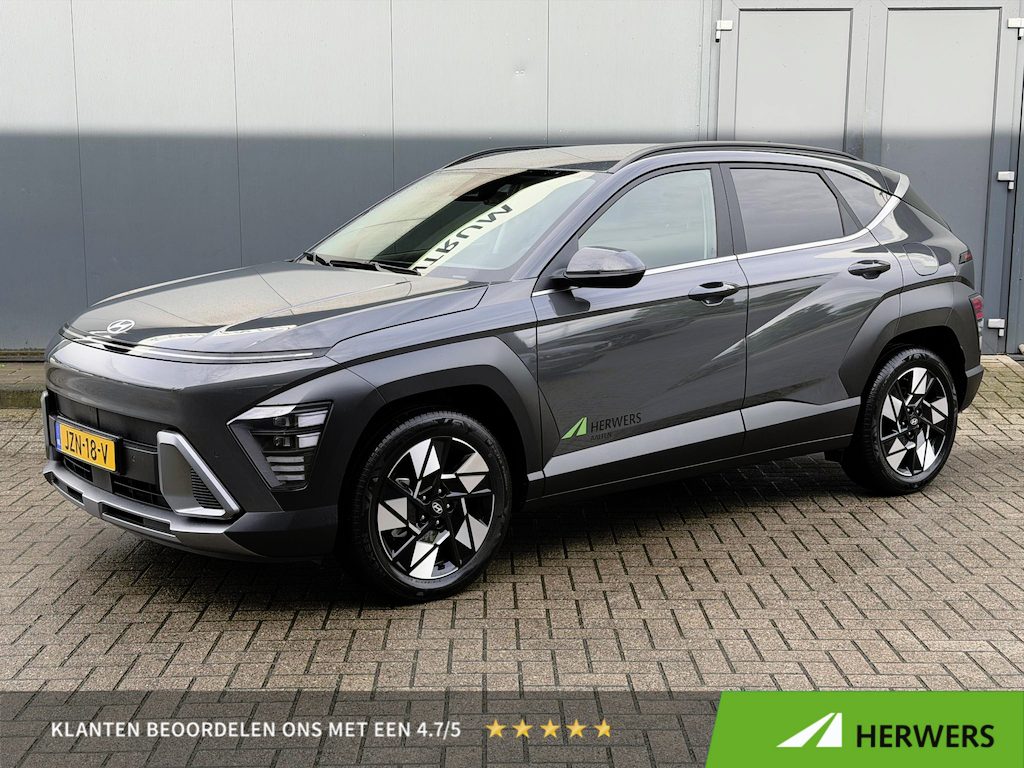 Hyundai Kona 1.6 GDI HEV Comfort Smart Voorstoelen verwarmd / Electrische achterklep / Origineel NL auto / Stuur verwarming / Privacy glas / Apple Carplay - Android Auto / Navigatiesysteem / 18 inch Lichtmetaal /