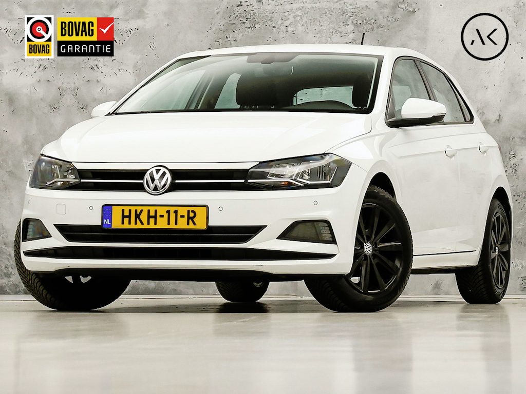 Volkswagen Polo 1.0 Sportline (APPLE CARPLAY, GROOT NAVI, CLIMATE, LM VELGEN, SPORTSTOELEN, PARKEERSENSOREN, CRUISE, NIEUWE APK, NIEUWSTAAT)
