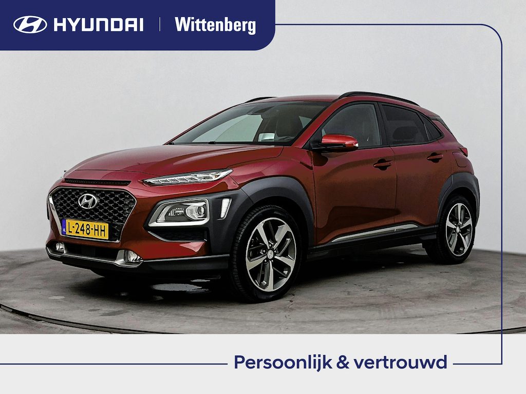 Hyundai Kona 1.0 T-GDI Premium | Leer | Stoel + stuurverwarming | Trekhaak | El. bed. stoelen | Dodehoek |