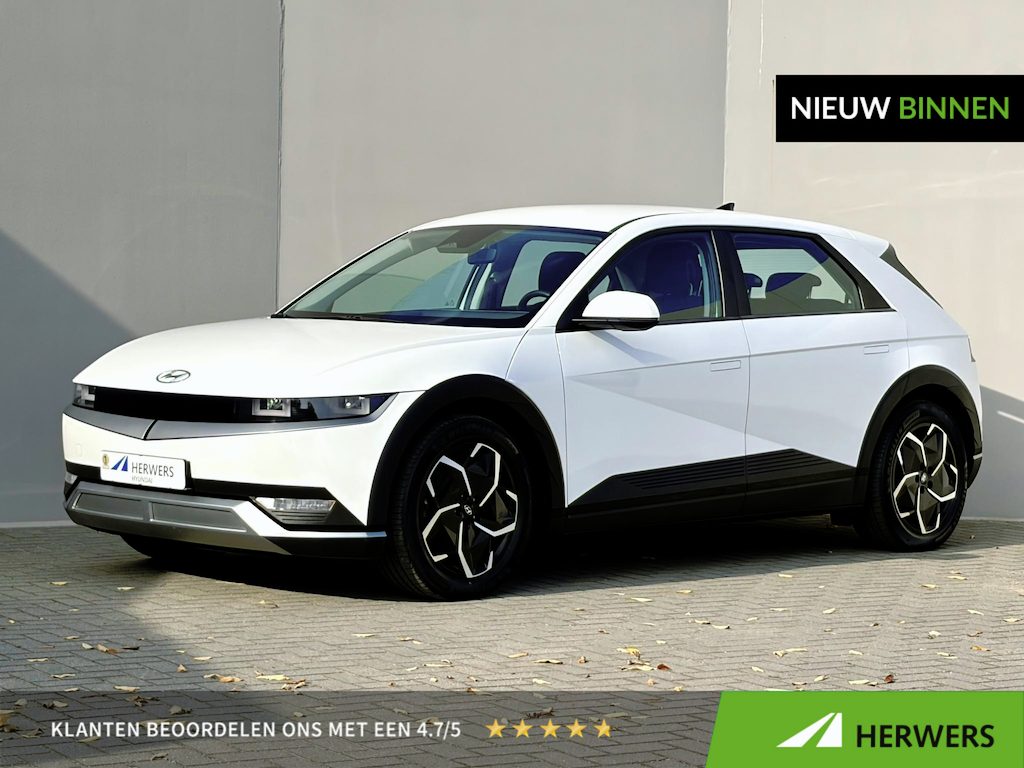 Hyundai Ioniq 5 Style 77.4 kWh / Dealer onderhouden / 1.600 kg Afneembare trekhaak / Fabrieksgarantie tot 09-2028 / Dakdragers / Camera / SOH 92% / Navigatie / Stoel en Stuurverwarming / Apple Carplay Android Auto /