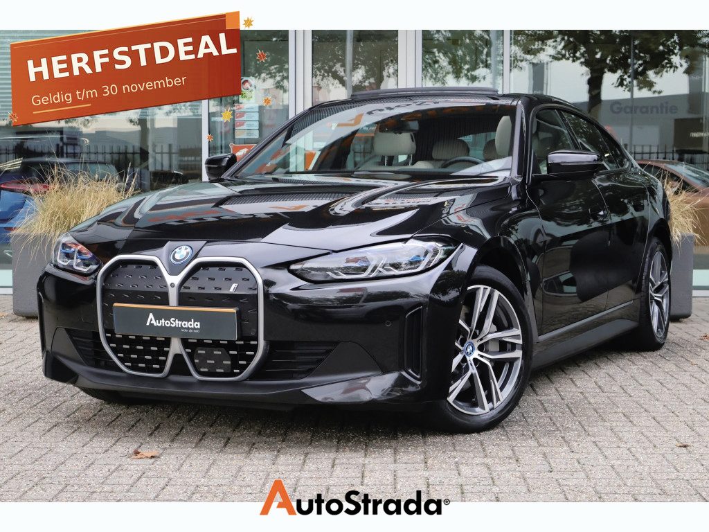 BMW i4 (G26) BEV eDrive40 340pk SoH 97% I Pano I Laser LED I Stoelverwarming I Navi I Cruise I Camera I 1e eigenaar