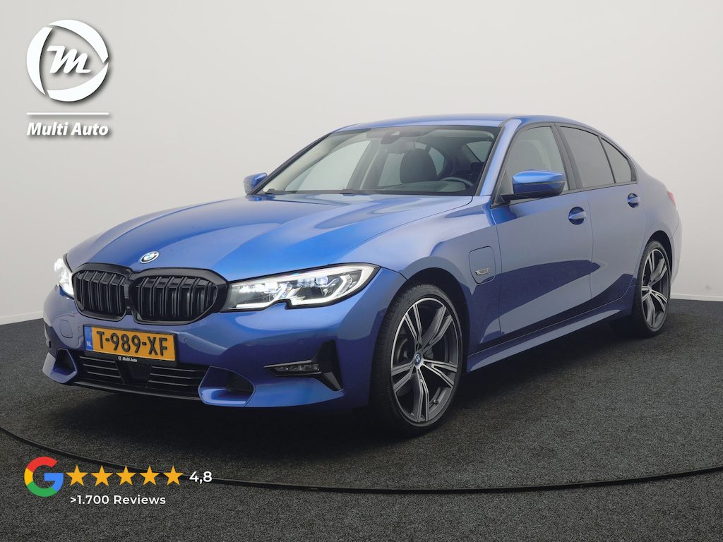 BMW 3-Serie 320e Advantage PHEV 204pk Dealer O.H | SOH 87,2% | Head Up | Adaptive Cruise | Camera | Adaptief Onderstel | Laser LED | Lederen Sportstoelen Memory & Verwarmd | Apple Carplay | Blis | Virtual | Navigatie | DAB | 19"L.M |