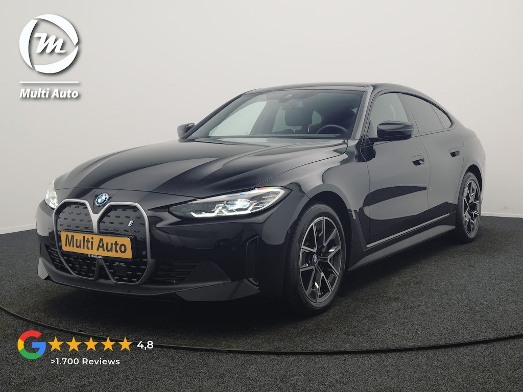 BMW i4 eDrive 35 70 kWh 286pk Dealer O.H | SOH 96,3% | Adaptive Cruise | Camera | Lederen Sportstoelen Verwarmd | Apple Carplay | Keyless | Navigatie | Virtual | DAB | 18"L.M |