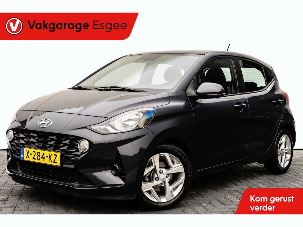 Hyundai i10 1.0 Comfort Smart 5-zits | Automaat | 23.600 Km | Fabrieks garantie tot en met Juli 2027 | | Pdc | 15 inch Lmv | Led | Airco | Cruise control | Navigatiesysteem | Bluetooth |