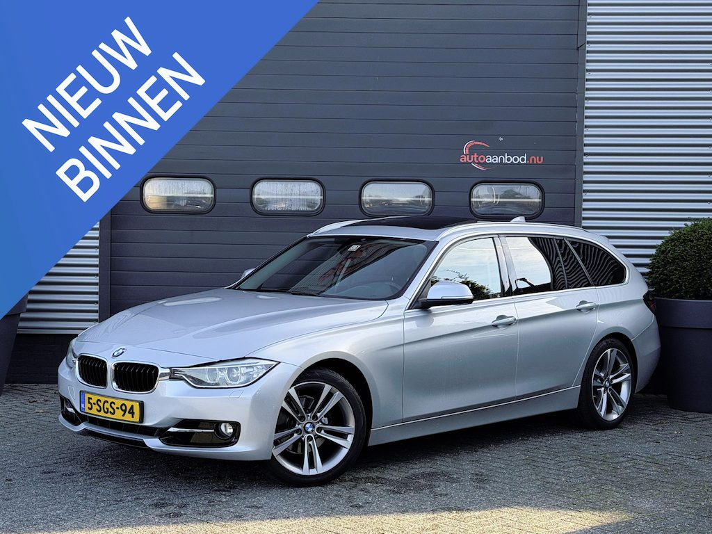 BMW 3-Serie Touring 320i High Executive | Panoramadak | Navigatie | Sportstoelen | Lichtmetalen Velgen |