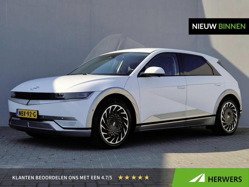 Hyundai Ioniq 5 Lounge 77.4 kWh / SOH 99% / Fabrieksgarantie tot 07-2028 / Dealer onderhouden / 1.600 kg afn. trekhaak / head-up display / Stoelventilatie / Stuur-, stoel- & achterbankverwarming / 20"  LM wielen / warmtepomp / CCS snellader /