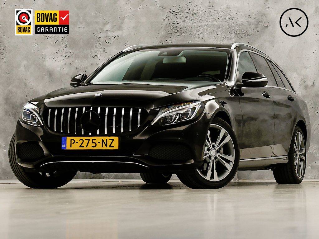 Mercedes-Benz C-klasse 180 AMG Sport Automaat (GROOT NAVI, PANAMERICANA GRILL, LEDER, STOELVERWARMING, GETINT GLAS, SPORTSTOELEN, CRUISE, NIEUWE APK, NIEUWSTAAT)