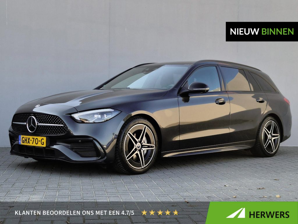 Mercedes-Benz C-klasse Estate 180 AMG Line / Trekgewicht 1.800 kg / All season banden / Burmester Audio Systeem / Elektrische achterklep / Rondomzicht camera / Adaptief cruise control / Climate control / Draadloze telefoon lader / Apple Carplay Android Auto /