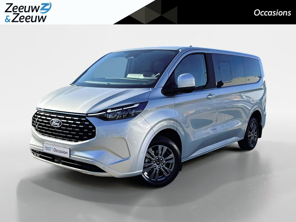 Ford Transit Custom Tourneo 340 2.5 PHEV L1H1 Titanium | Elek. Trekhaak | 2300KG Trekgewicht | Stoel/Stuur/Voorruitverwarming | Cruise Control | Parkeer Camera | 8 zitplaatsen |