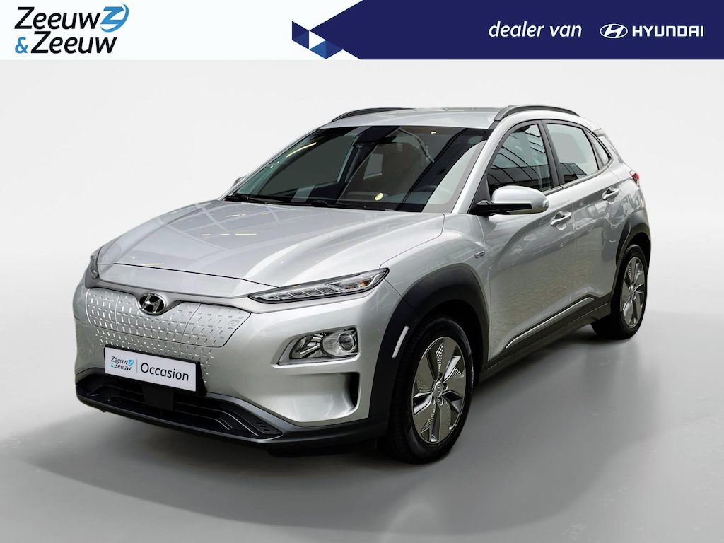Hyundai Kona Electric EV Comfort 64 kWh | Warmtepomp | 100% SOH | Adaptive cruise control | Apple Carplay & Android Auto | Achteruitrijcamera | Parkeersensoren achter | Keyless entry | DAB radio |