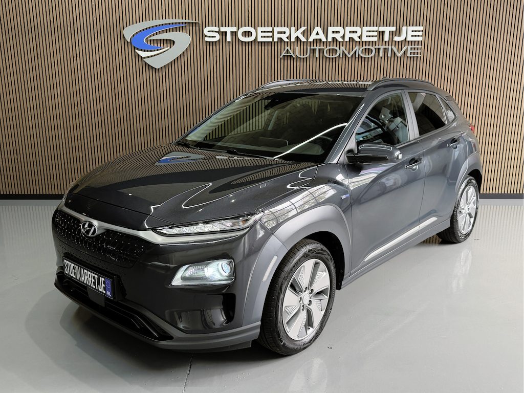 Hyundai Kona Electric EV 64 kWh SOH 100% NavI | Warmtepomp | Stoel & Stuur verwarming | 17" | ACC | 100 % elk jaar Dealer onderhouden!