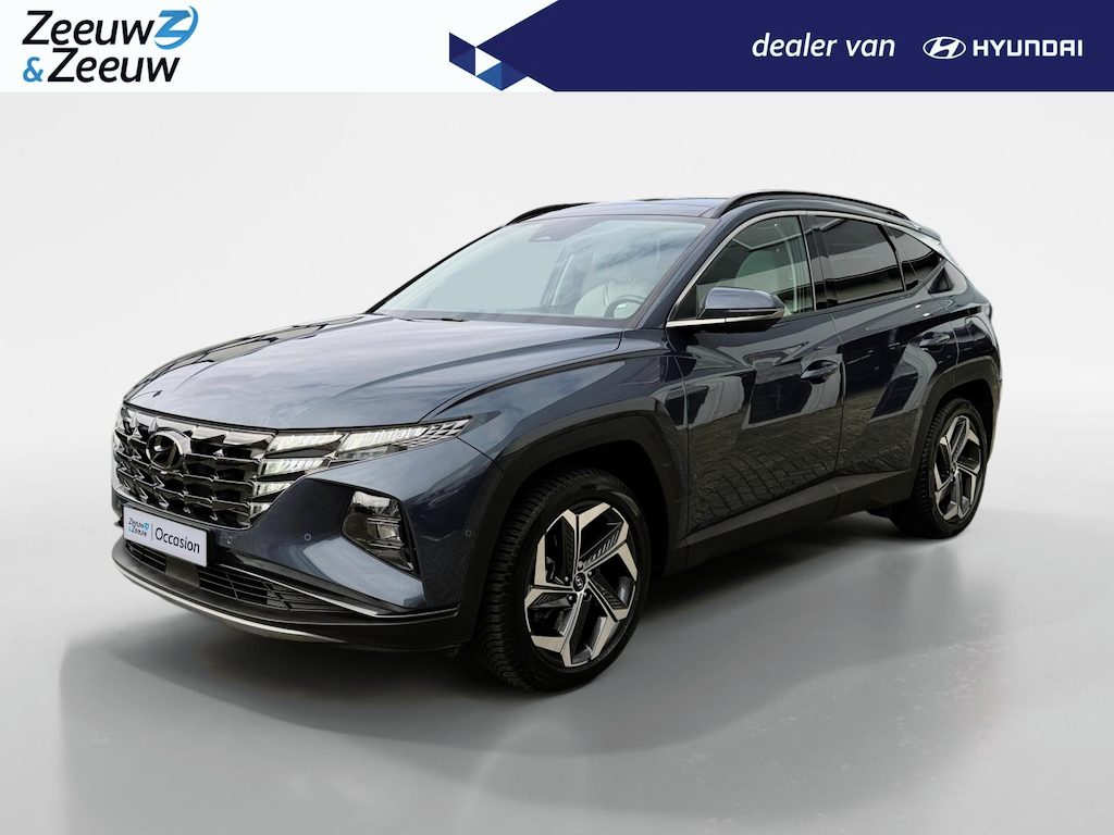 Hyundai Tucson 1.6 T-GDI PHEV Premium Sky 4WD | Zeer compleet | Open dak | Unieke bekleding | Trekhaak | 360 graden camera | Stoel koeling & verwarming |