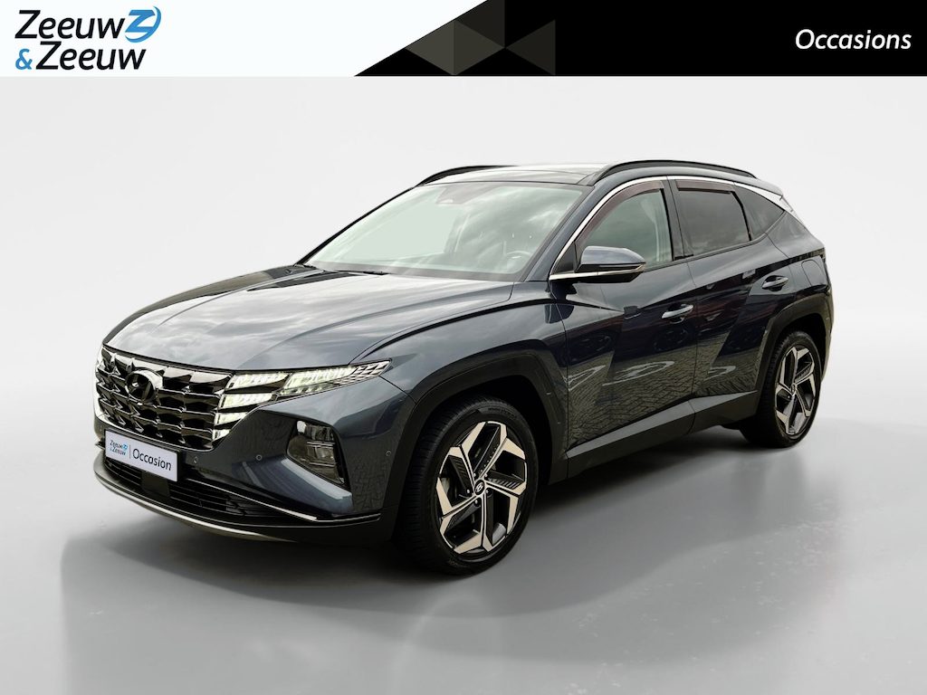 Hyundai Tucson 1.6 T-GDI HEV Premium Sky | + Winterbanden! | 1650kg trekgewicht | Navi | 360 Camera | Stoel+ stuurverwarming | Elek. stoelverstelling