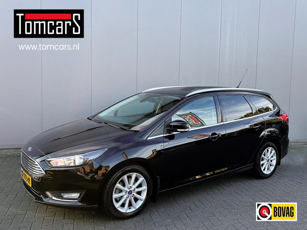 Ford Focus Wagon 125PK Titanium Navigatie/Parkeerhulp/Bluetooth/Stoelverwarming