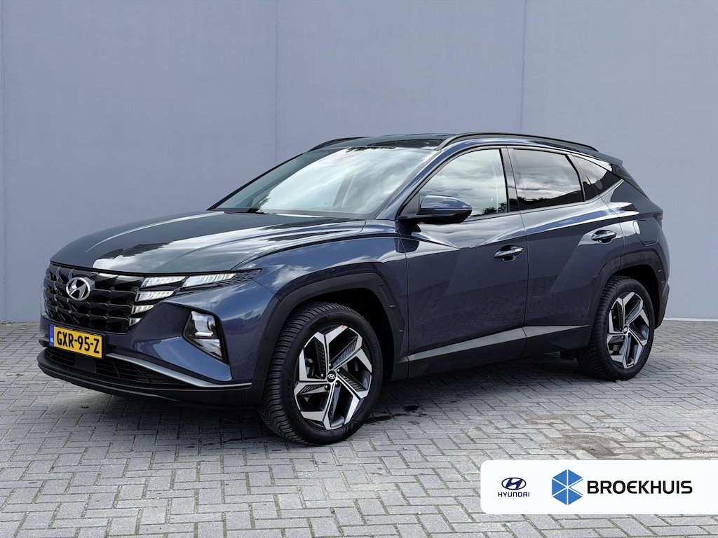 Hyundai Tucson 1.6 T-GDI PHEV Comfort Smart 4WD / Dealer Onderhouden / Fabrieksgarantie tot 9-2028 / Navigatie / Adaptieve Cruise / Stoel & Stuurwiel Verwarming / Keyless /