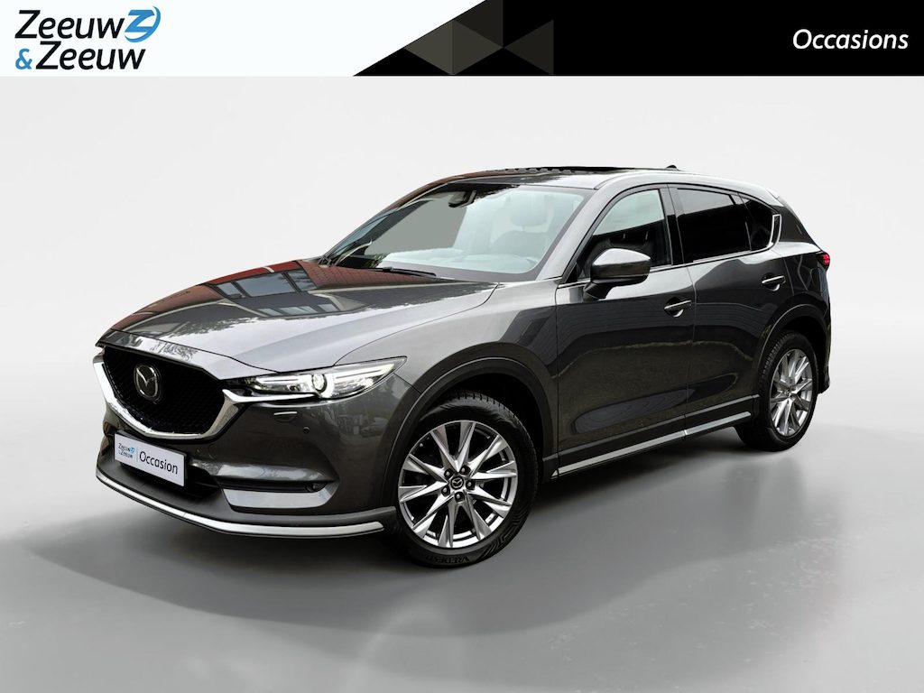 Mazda CX-5 2.0 SkyActiv-G 165 Signature | Schuif/kanteldak | 360 graden camera | Wegklapbare Trekhaak | Adaptieve Cruise Control | Navigatie | BOSE | Leder | 19" Lichtmetalen velgen