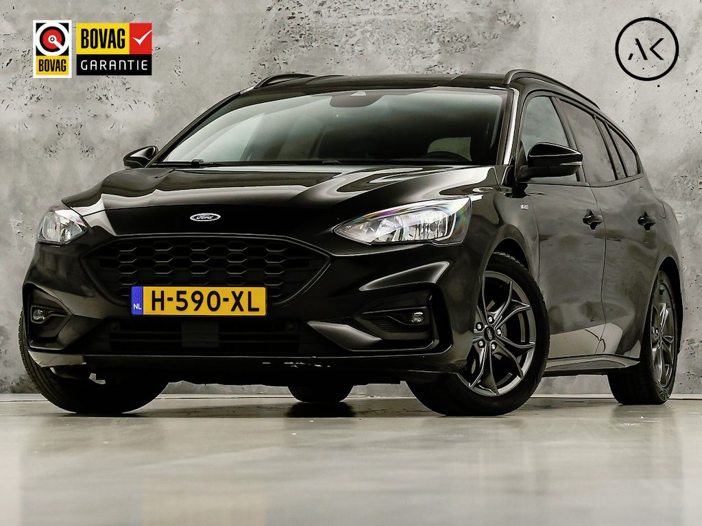 Ford Focus Wagon 1.0 EcoBoost ST Line Automaat (APPLE CARPLAY, GROOT NAVI, STUUR/STOELVERWARMING, CAMERA, SPORTSTOELEN, GETINT GLAS, ADAPTIVE CRUISE, TREKHAAK, NIEUWE APK, NIEUWSTAAT)