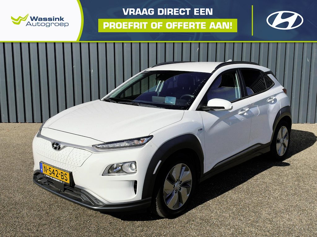 Hyundai Kona Electric EV Fashion 64 kWh SOH 96.6% | Camera | Parkeersensoren | Navigatie | Cruise Control | Stoelverwarming |