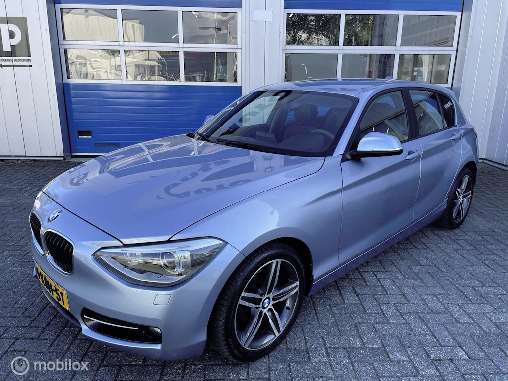 BMW 1-Serie 114i Upgrade Edition Leer-Sport-Xenon-Nw ketting