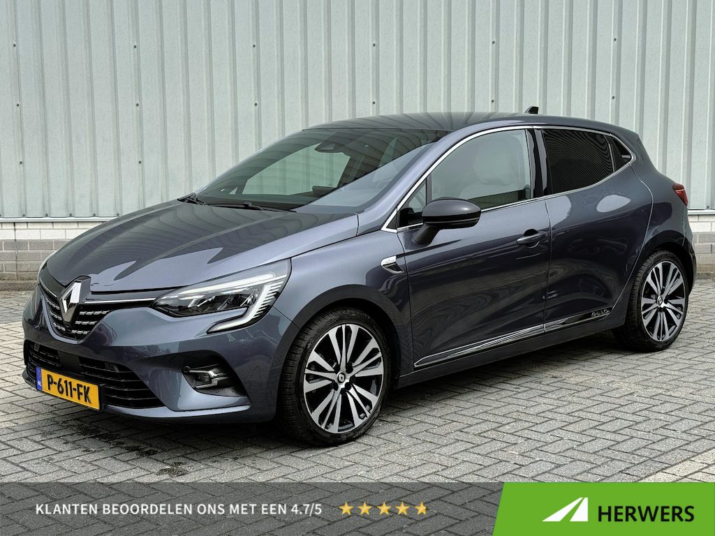 Renault Clio E-Tech Hybrid 140PK Initiale Paris / BOSE Premium Audio / Lederen Bekleding / Stoel & Stuurverwarming / Apple Carplay & Android Auto / All Season Banden / Trekhaak / Navigatie / Achteruitrijcamera /