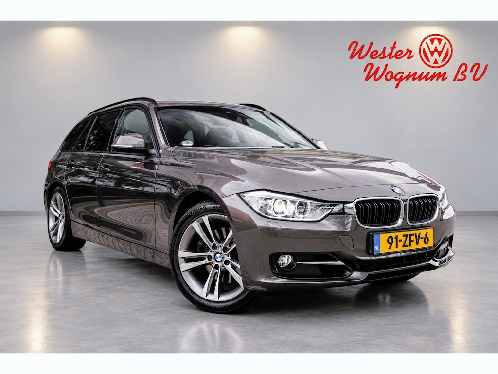 BMW 3-Serie Touring 328i Touring | PDC | Xenon | Navi | PDC | 18" lmv | Trekhaak | Climate