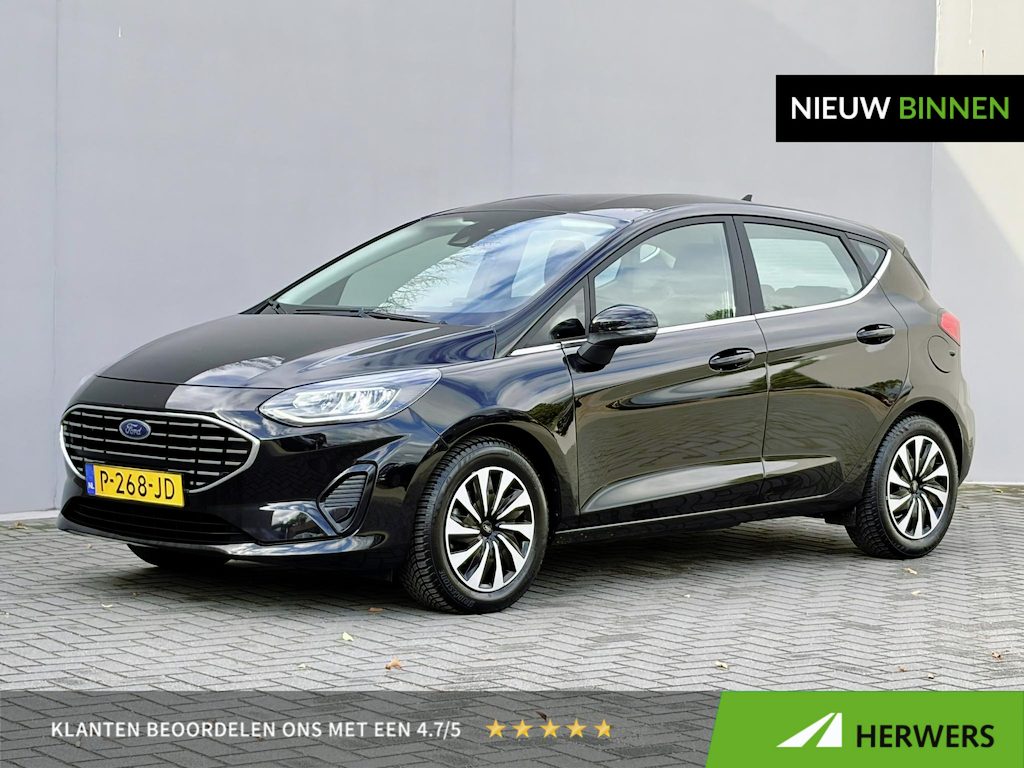 Ford Fiesta 1.0 EcoBoost Hybrid Titanium / Navigatie / Apple Carplay of Android Auto / Stuur- Stoel & Voorruitverwarming / All Season Banden / Cruise control / Climate control / Parkeersensoren achter /