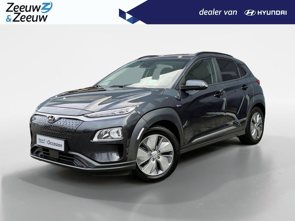 Hyundai Kona Electric EV Fashion 64 kWh | Zeer nette auto | 100 % SOH | Stoelverwarming | Navigatie | Apple CarPlay & Android Auto | Achteruitrijcamera | Dealer onderhouden |