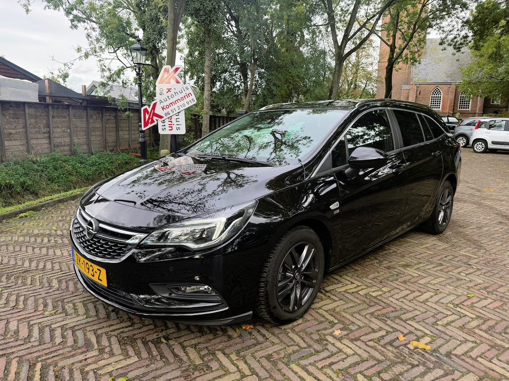 Opel Astra Sports Tourer 1.4 Turbo 120 Jaar Edition, carplay.Wij zijn altijd de goedkoopste met de beste Vakgarage BOVAG service.