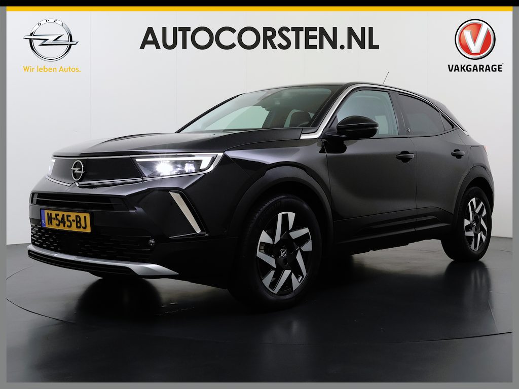 Opel Mokka-e 136PK Automaat Adap.Cruise Warmtepomp Leder 360°Camera Stoelverwarming Navi Android Auto Apple Carplay 50kWh SOH 87% Business Elegance Ecc Privacy Glas Led Isofix DAB Bluetooth Lmv 17" Regen-Lichtsensor Lane Assist 1e Eigenaar Dealeronderhouden Origineel Nederlandse Auto