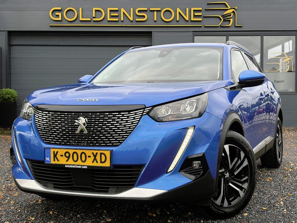 Peugeot 2008 1.2 PureTech Blue Lease Allure ✓2e Eigenaar✓360° Camera✓Draadloze telefoonlader✓Carplay✓6 bak✓Halfleder✓Navi✓Clima✓Cruise✓17'' Lmv✓Rijstrooksensor✓102pk✓Dealer onderhouden✓N.A.P✓Apk tot 04-2027