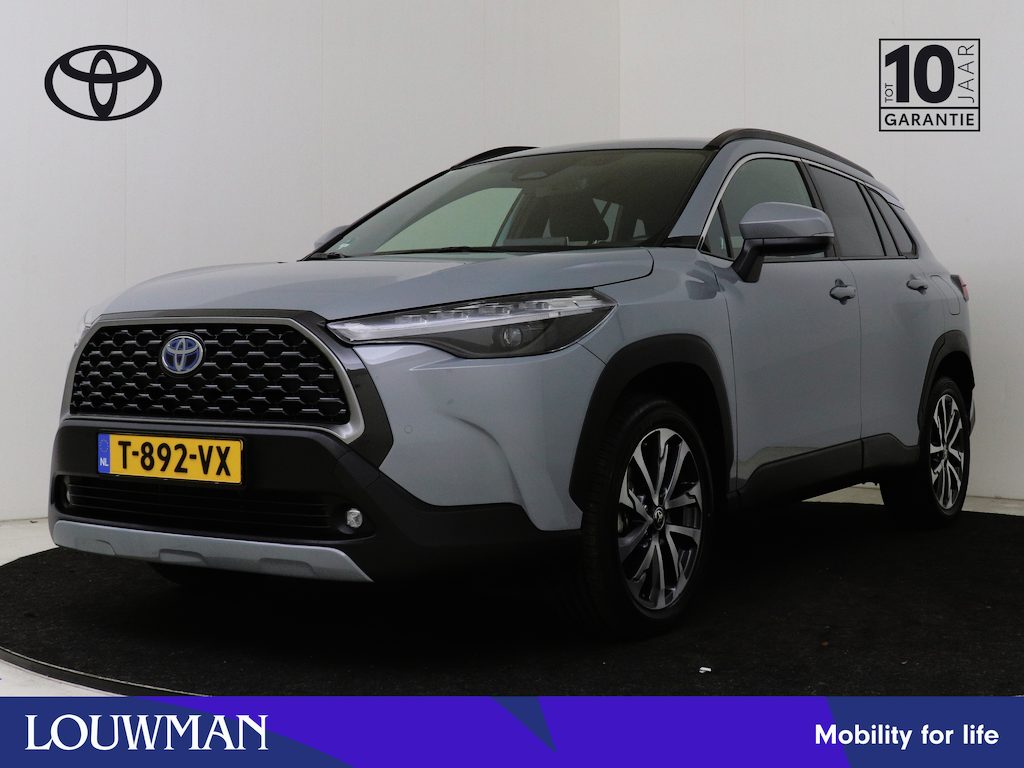 Toyota Corolla Cross Hybrid 200 Style Limited | Dealer onderhouden | Stoel+stuurverwarming | Dodehoek detectie | Elektrische achterklep | Parkeersensoren voor+achter | Draadloze telefoonlader |