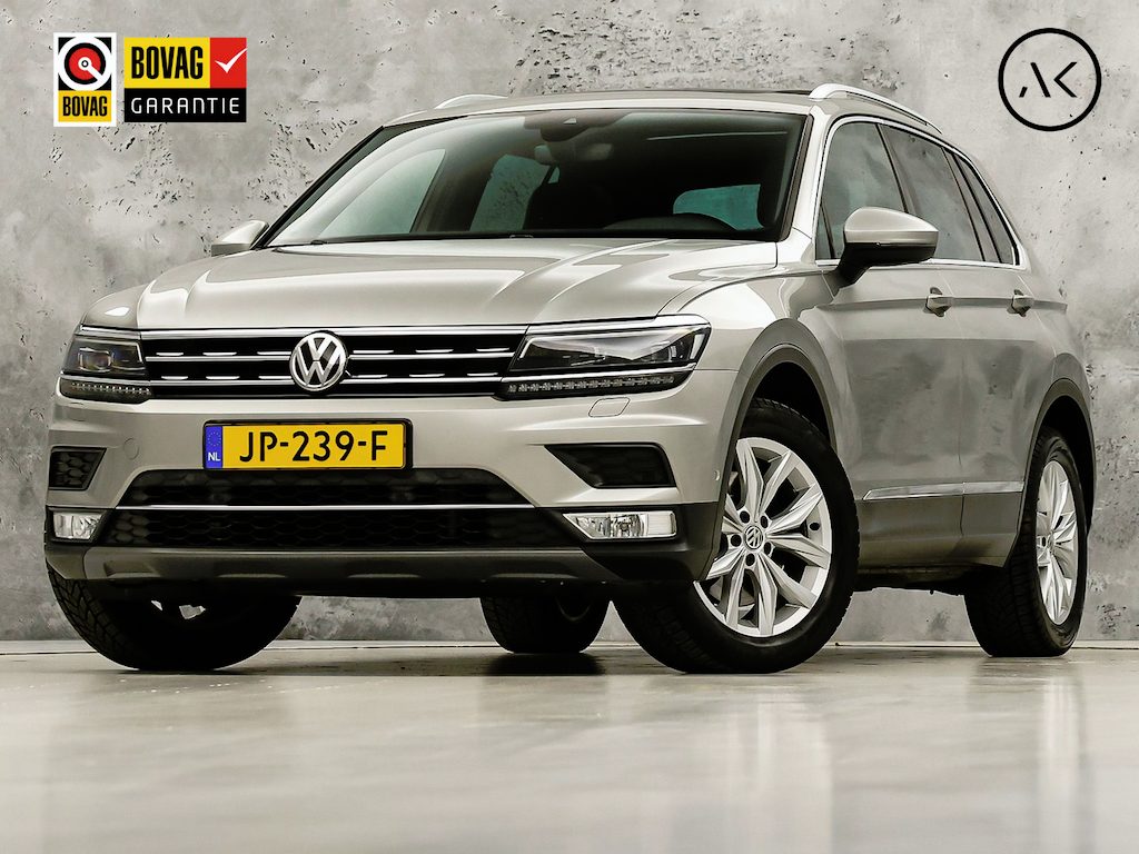 Volkswagen Tiguan 2.0 TSI 4Motion Highline 180Pk Automaat (PANORAMADAK, DYN AUDIO, VIRTUAL COCKPIT, MEMORY SEAT, LEDER, ZWART HEMEL, APPLE CARPLAY, CAMERA, STOELVERWARMING, ADAPTIVE CRUISE, TREKHAAK, GETINT GLAS, NIEUWSTAAT)