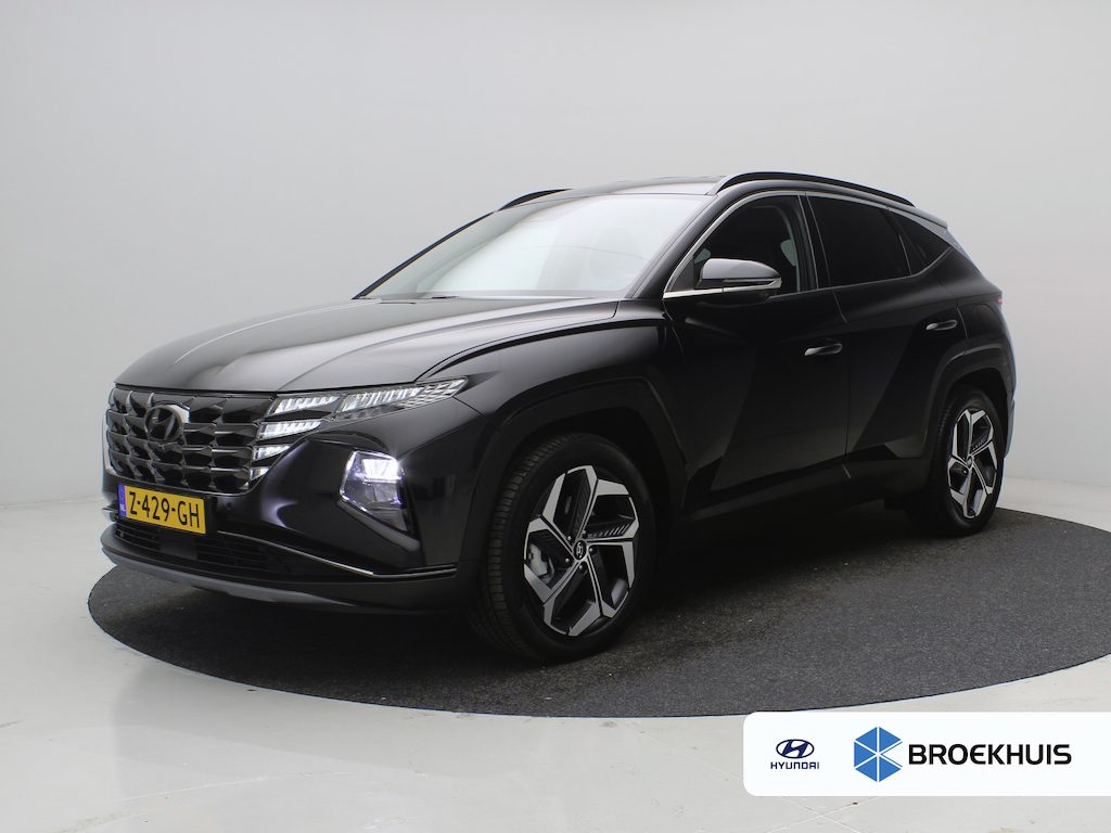 Hyundai Tucson 1.6 T-GDI 265pk PHEV Premium 4WD | Leder | Carplay | Climate | Keyless | Navigatie | Elek. Klep | Full - Led | 360 Camera | KRELL Audio | Elek. Stoelen | 19" Lichtmetaal | Winterpakket | Stoelventilatie | Dodehoek Detectie