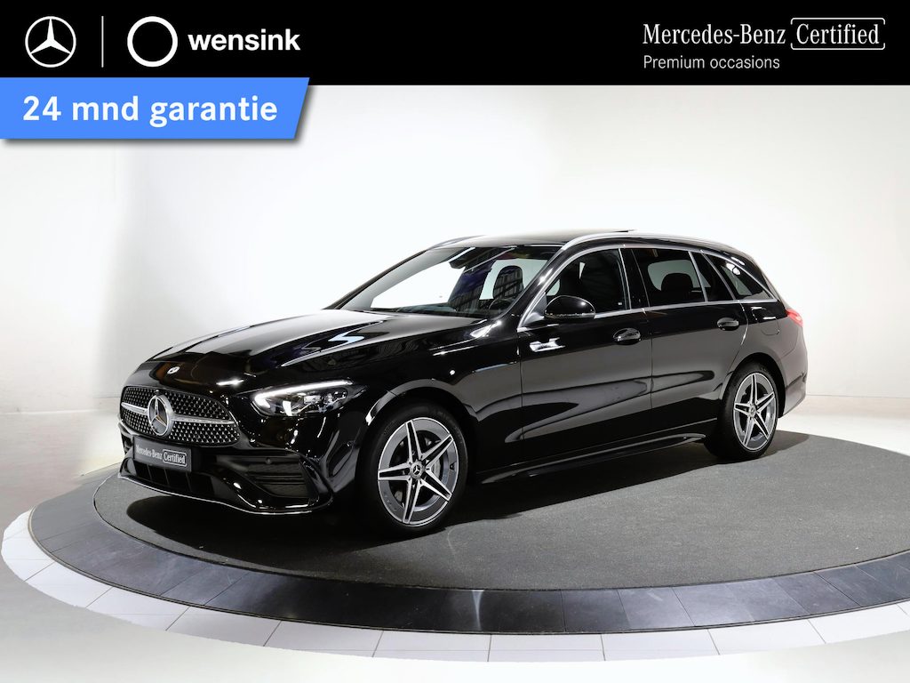 Mercedes-Benz C-klasse Estate 300 e AMG Line | Panoramadak | Memory | Trekhaak | Stoelverwarming | Achteruitrijcamera | Sfeerverlichting |