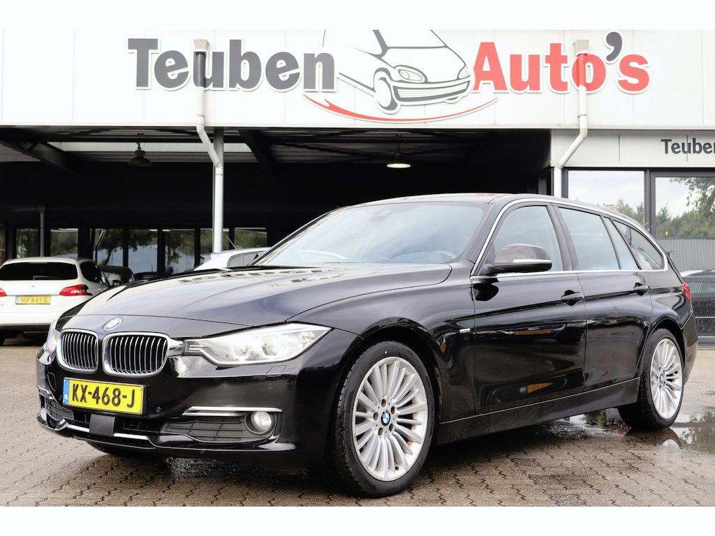 BMW 3-Serie Touring 320d Automaat | Luxury Line | Cruise control adaptief | Head up display | Camera | Leder