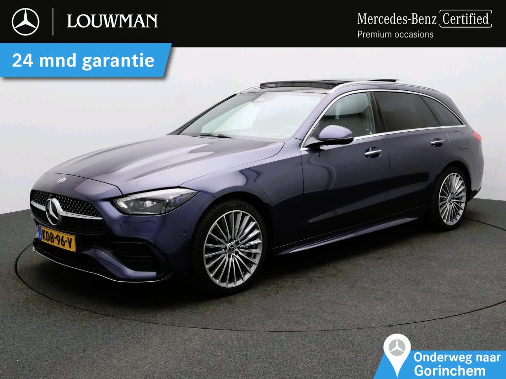 Mercedes-Benz C-klasse Estate 300 e Business Solution AMG Trekhaak | AMG | Panorama Schuif-Kanteldak | Head-up display | 19 Inch AMG Velgen | Alarm klasse 3 | Burmester® 3D | Parkeerpakket met 360°-camera. Inclusief 24 maanden Mercedes-Benz Certified garantie voor Europa.
