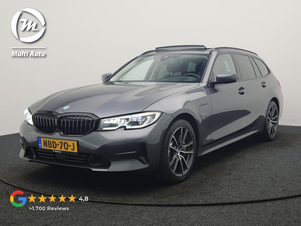 BMW 3-Serie Touring 330e PHEV 293pk Dealer O.H. | Panodak | Adaptive Cruise | Head Up | 360 Camera | Laser LED | Lederen Sportstoelen Memory & Verwarmd | Sfeerverlichting | BLIS | Keyless | Apple Carplay | Navigatie | DAB | Plug In Hybrid